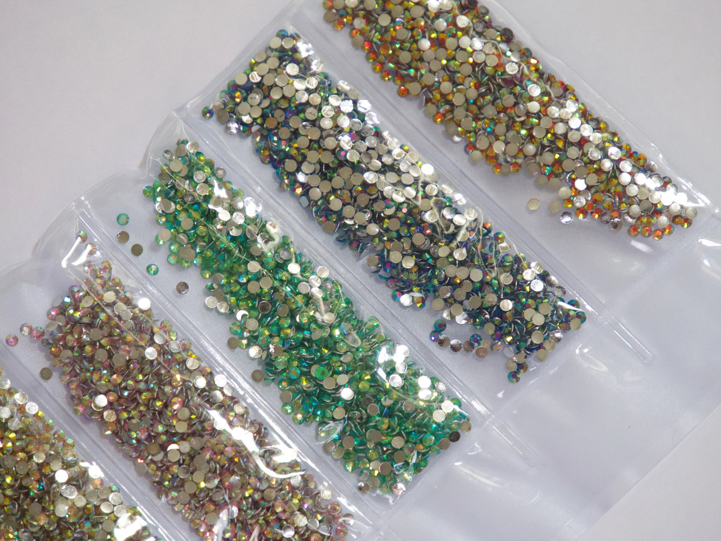 6000pcs Iridescence AB Rhinestone/ 2mm Non Hot fix Flat Nail Art Deco/ Tiny Green Blue Red Round Beads Gem Pearls for 3D Nail Art
