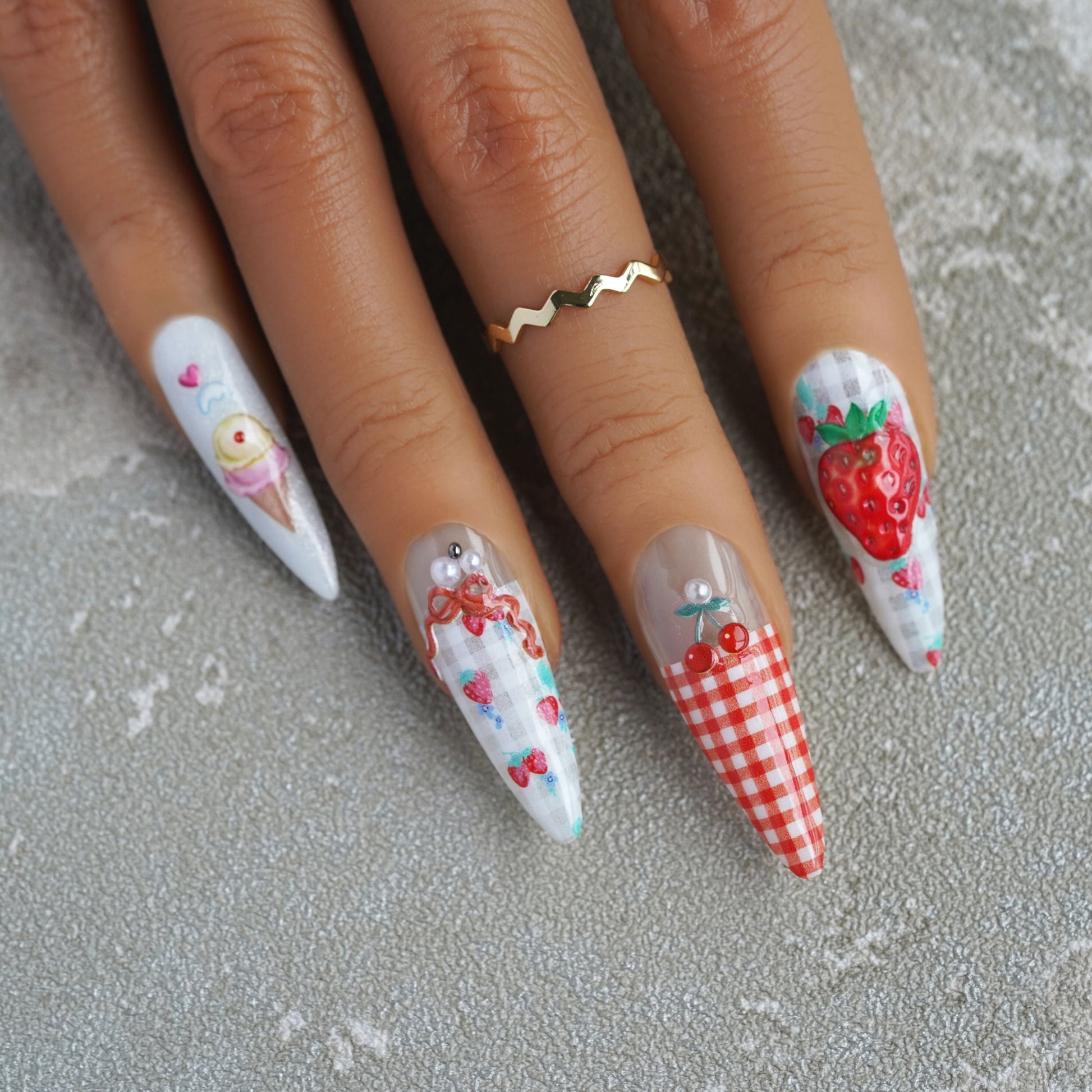 long press on nails made of strawberry stickers