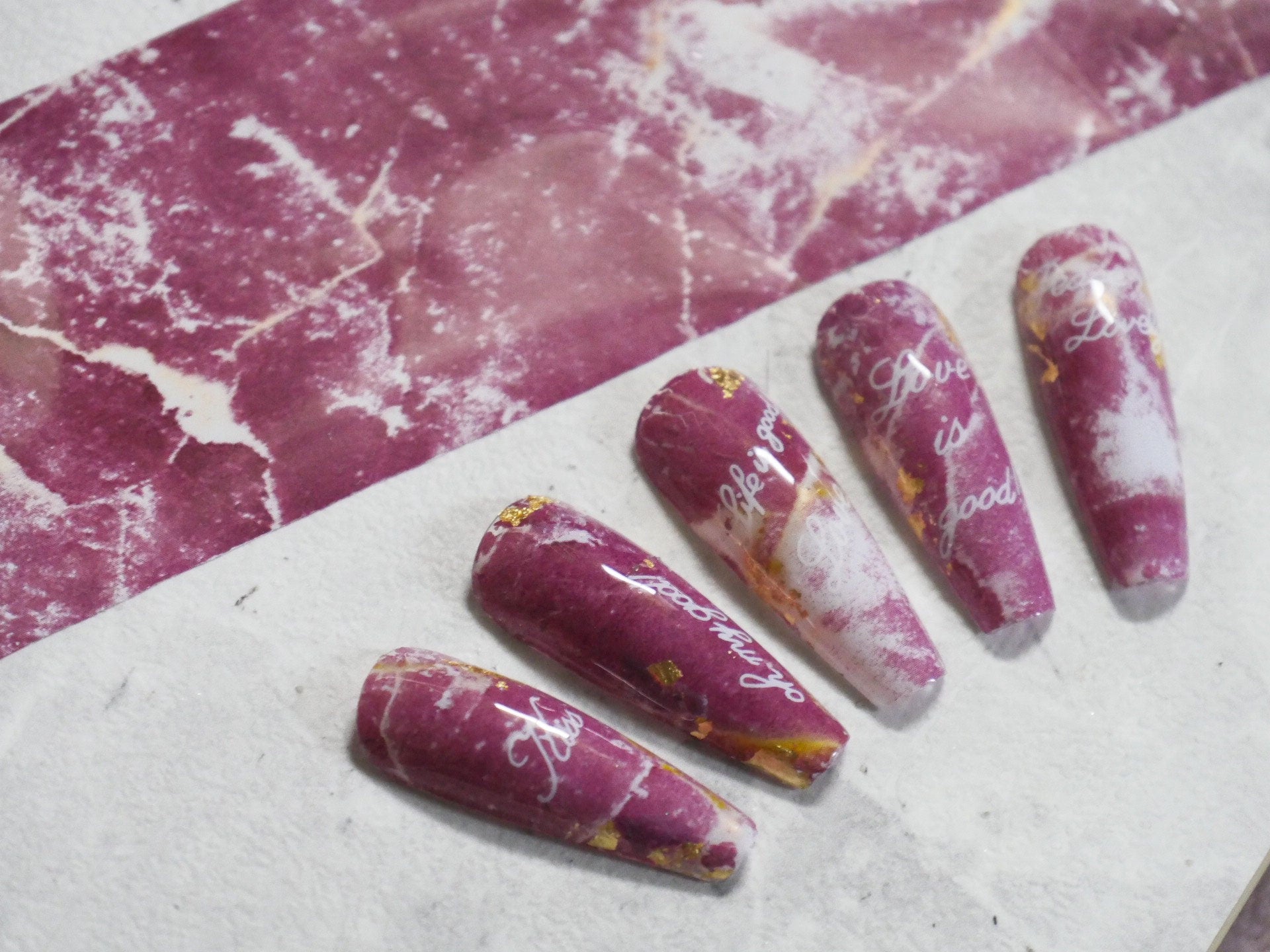Maroon Nails with Elegant Marbled Veins
